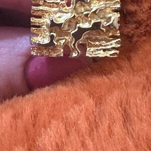 Christian Dior gold tone cufflink. Single cufflink